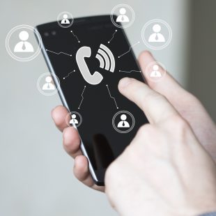 Businessman hand press telephone button call icon