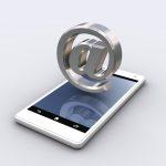 email symbol and smartphone