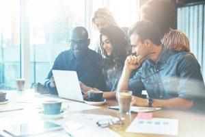 Group of attractive entrepreneurs in meeting