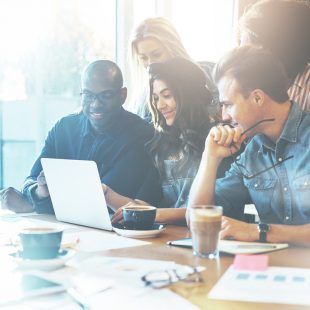 Group of attractive entrepreneurs in meeting