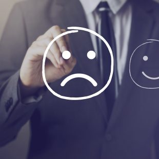 Customer choosing to write unhappy face over happy face